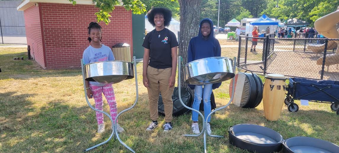Lanyah Gillie (left), Nariah Cooper (center) and Saniyah Williams (right), from the Bellport  Boys and Girls Club, are getting ready to perform at the Unity Day event.